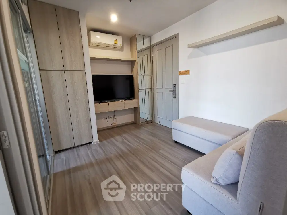 Modern living room with sleek design and built-in TV unit