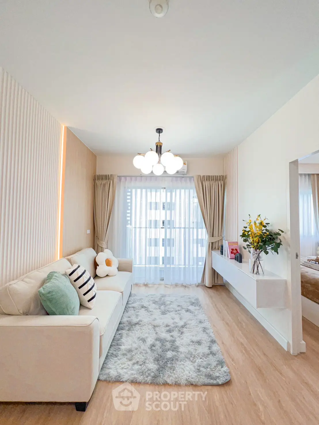 Chic modern living room with cozy sofa and elegant decor