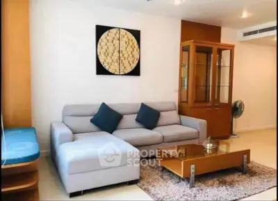 Modern living room with stylish decor and comfortable seating in a contemporary apartment.