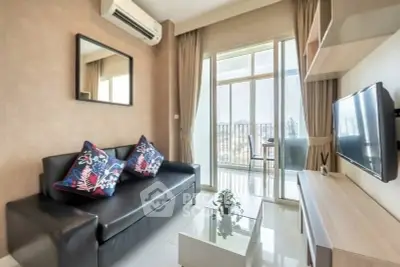 Modern living room with balcony view, sleek furniture, and air conditioning in a stylish apartment.