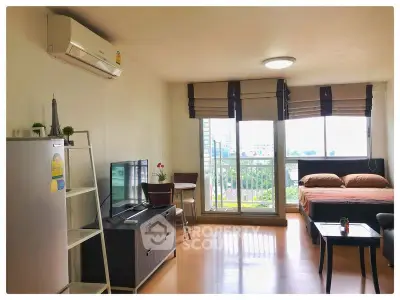 Modern studio apartment with balcony and natural light