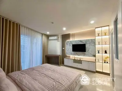 Luxurious modern bedroom with stylish decor and ambient lighting