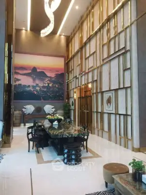 Luxurious high-ceiling living room with elegant decor and stunning artwork