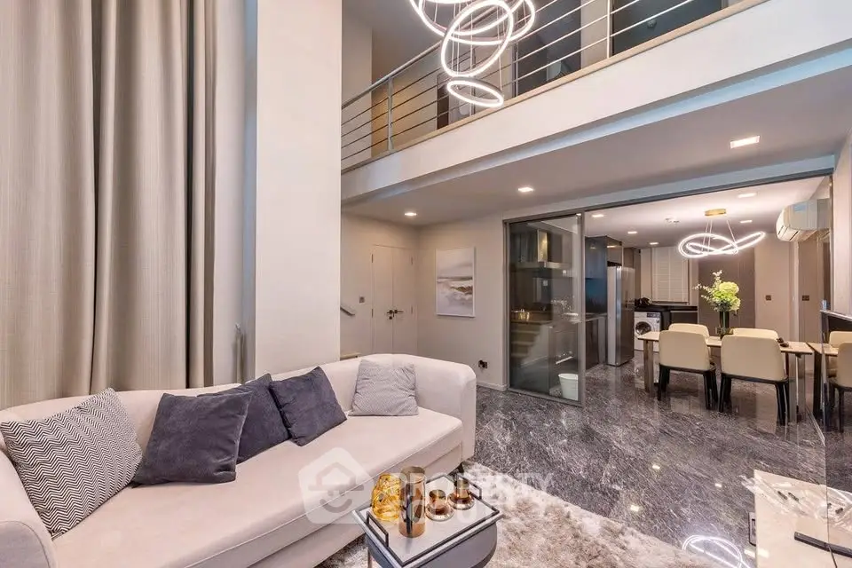 Luxurious modern living room with open layout and elegant lighting