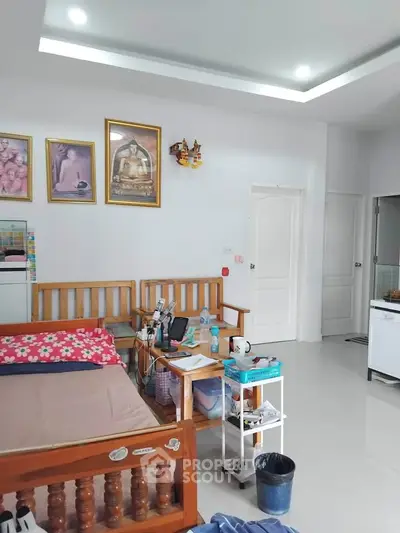 Cozy bedroom with wooden furniture and modern decor