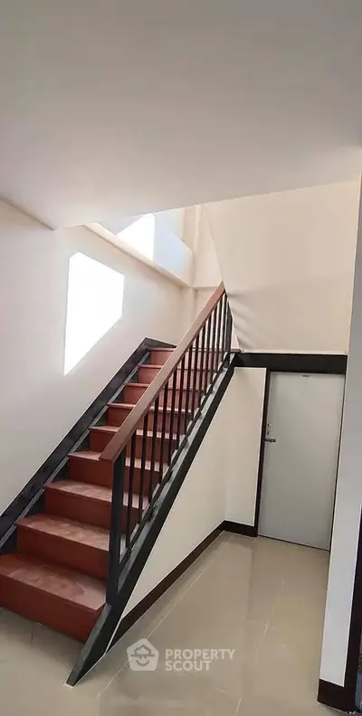 Modern staircase with sleek design in a bright interior space