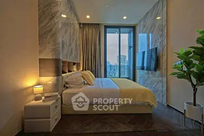 Luxurious bedroom with city view, modern decor, and cozy ambiance.