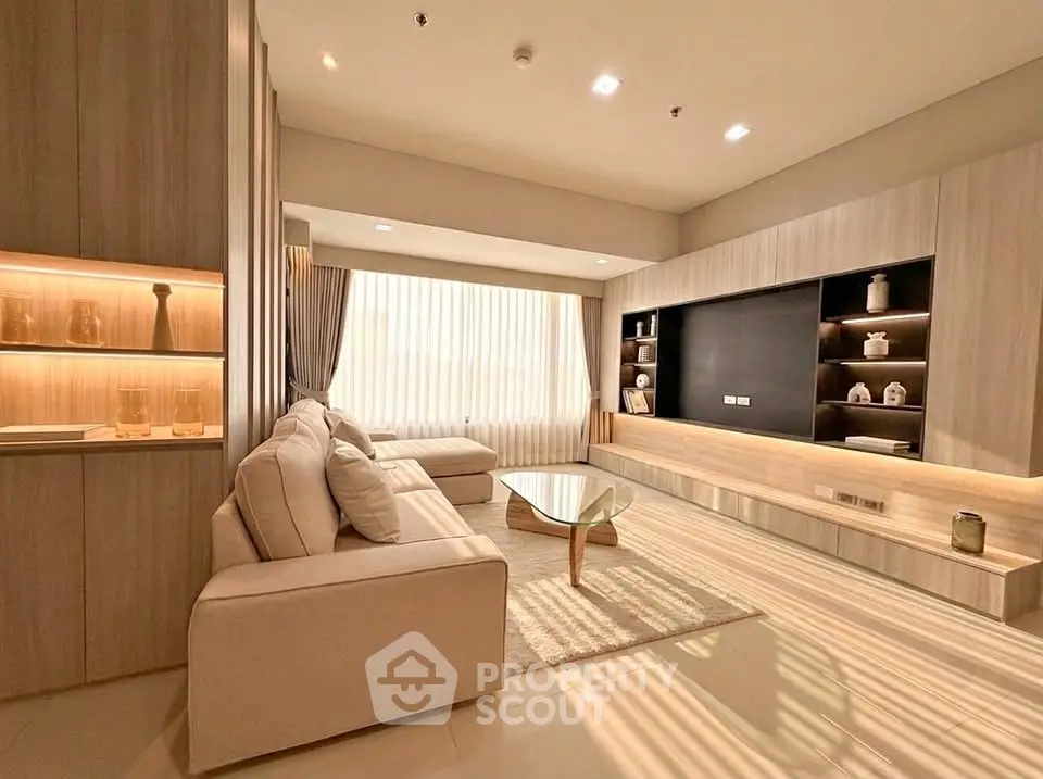 Luxurious modern living room with elegant decor and ample natural light