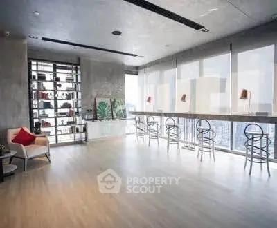 Spacious modern living room with city view and stylish decor