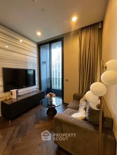 Luxurious living room with modern decor and city view, featuring elegant lighting and cozy seating.
