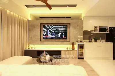 Modern living room with stylish decor and open kitchen layout