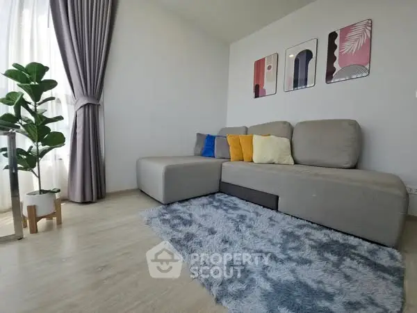 Modern living room with stylish decor and cozy seating area