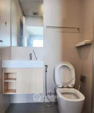 Modern bathroom with sleek fixtures and contemporary design.