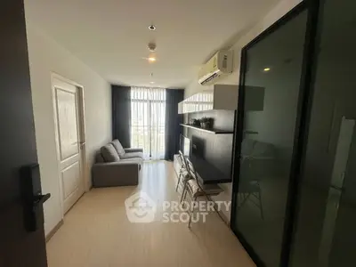 Modern living room with sleek furniture and natural light
