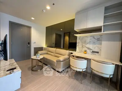 Modern living room with elegant furniture and marble accents