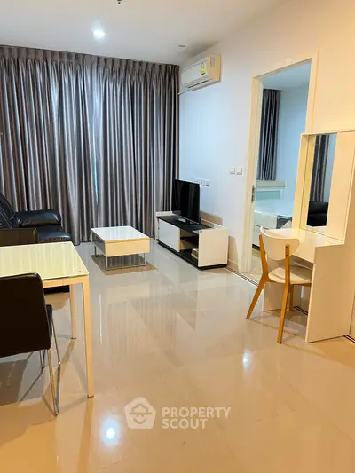 Modern living room with sleek furniture and natural light