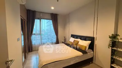 Modern bedroom with city view, featuring cozy bed and elegant decor in a high-rise apartment.