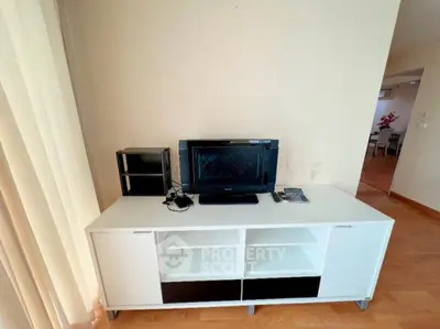 Modern living room with sleek TV stand and minimalist decor