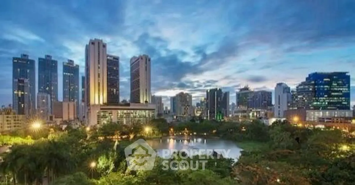 Stunning cityscape view with lush greenery and modern skyscrapers at dusk.