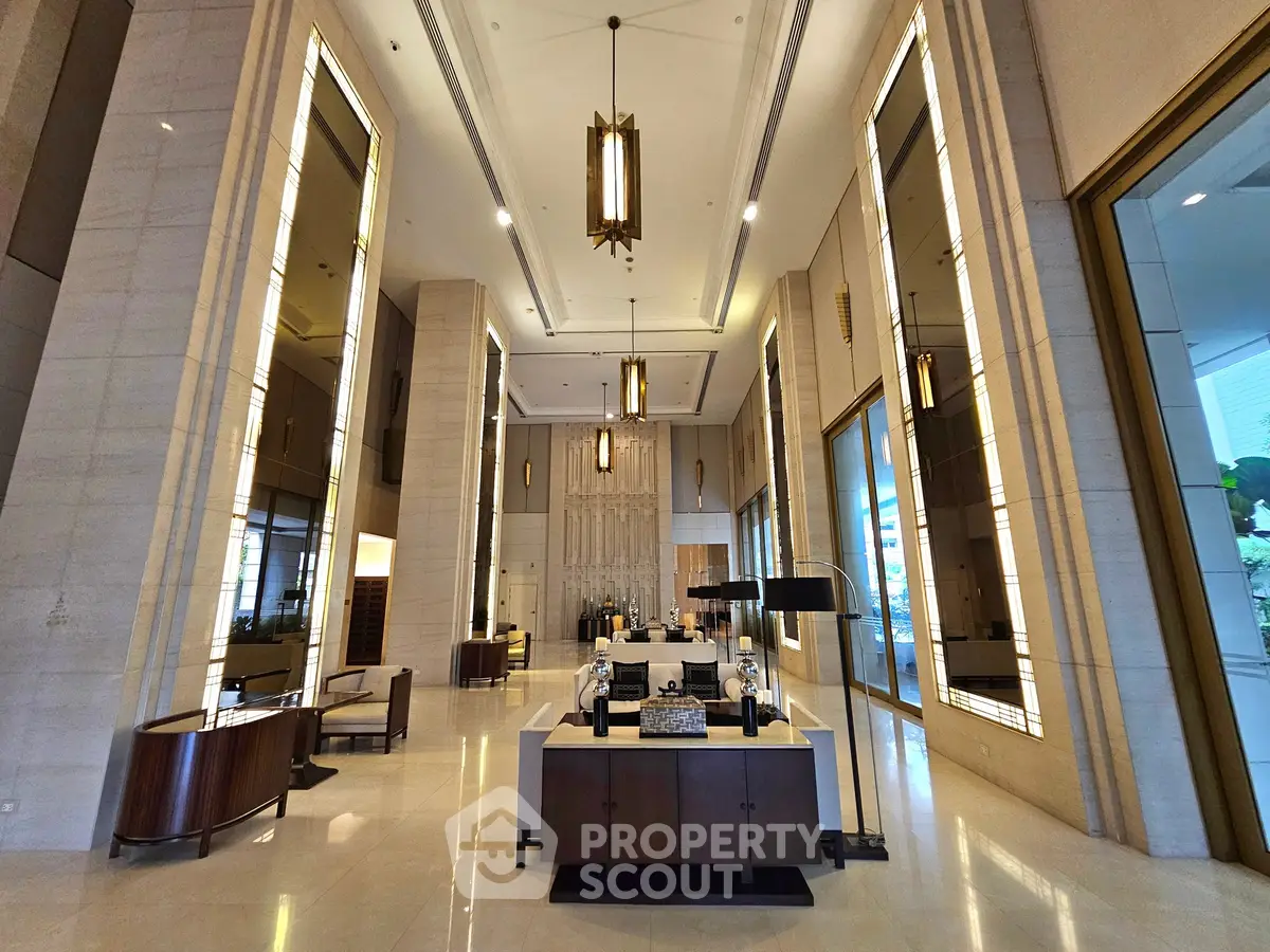 Luxurious modern lobby with high ceilings and elegant decor