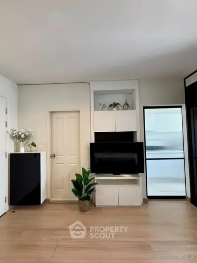 Modern living room with sleek TV setup and stylish decor