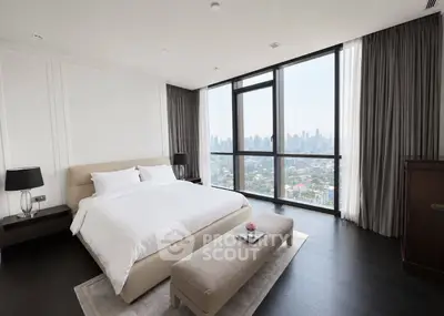 Luxurious bedroom with panoramic city view and elegant decor