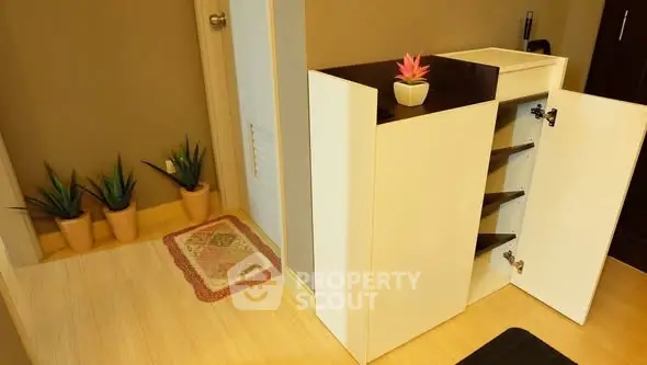 Modern interior with stylish storage and decorative plants