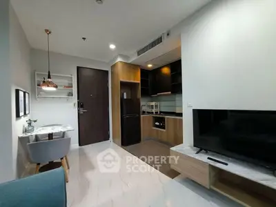 Modern apartment interior with open kitchen and cozy living area