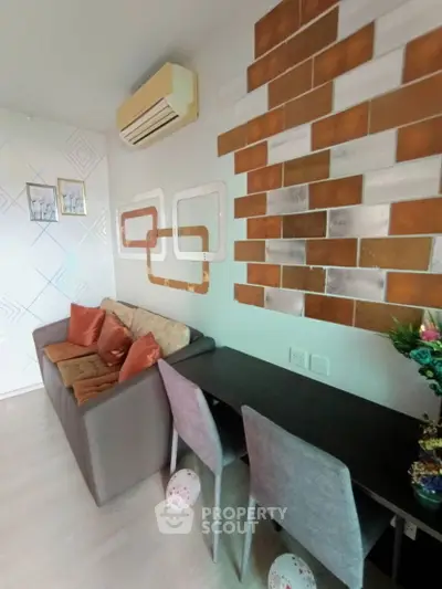Modern living room with stylish decor and air conditioning