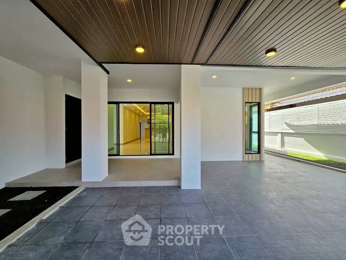 Spacious modern home entrance with sleek design and ample natural light.