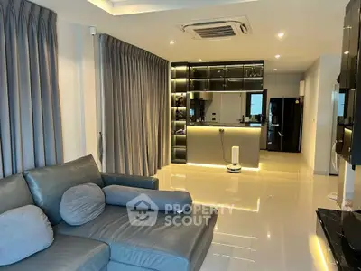 Luxurious modern living room with sleek design and ambient lighting