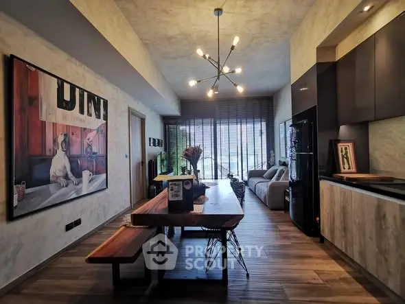 Modern living room with stylish decor and open kitchen layout