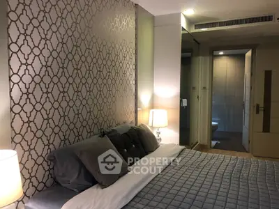 Luxurious bedroom with elegant wallpaper and cozy lighting
