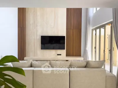 Luxurious modern living room with high ceilings and elegant decor