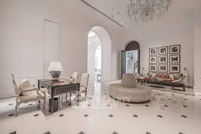 Luxurious living room with elegant chandelier and classic decor