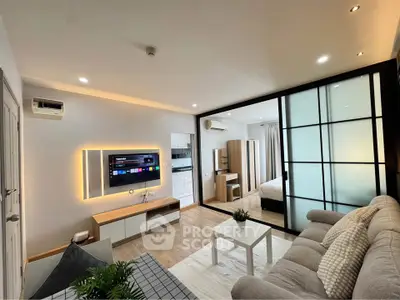 Modern open-plan living room with sleek design and cozy ambiance