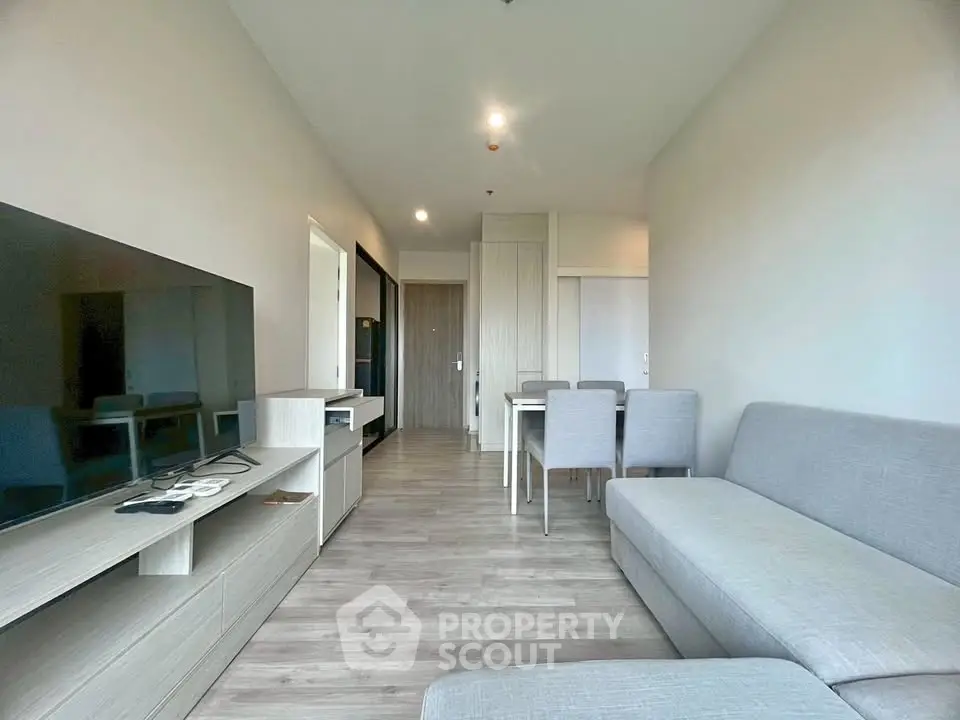 Modern living room with sleek furniture and open layout, perfect for contemporary living.