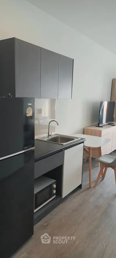 Modern kitchen with sleek design and stainless steel appliances