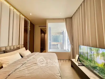 Luxurious modern bedroom with elegant decor and large window view