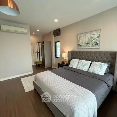 Luxurious bedroom with plush bedding and modern decor