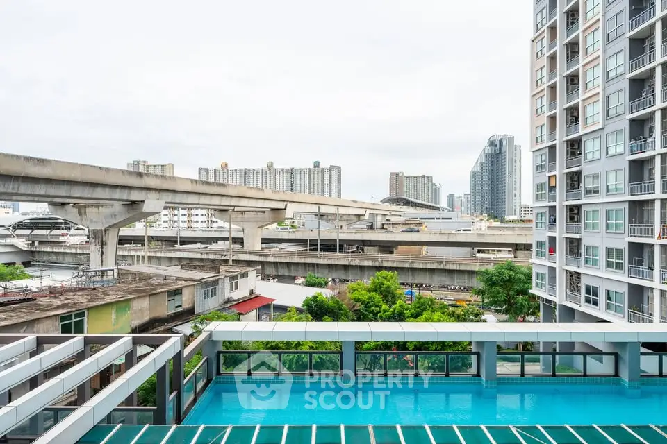 Modern urban apartment with pool and city view, ideal for vibrant city living.