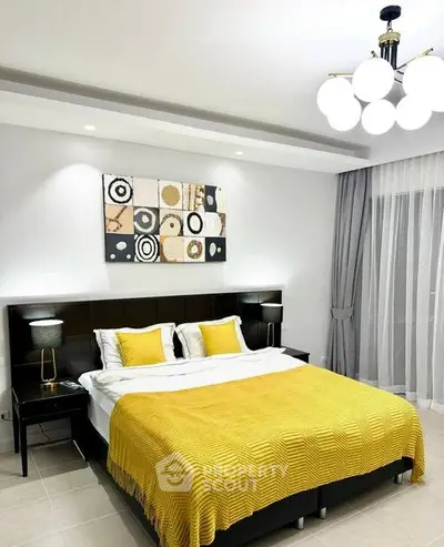 Modern bedroom with stylish decor and bright yellow accents