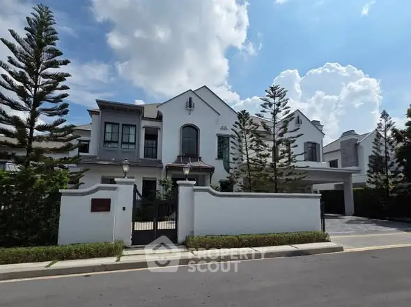 Luxurious modern villa with elegant architecture and lush landscaping