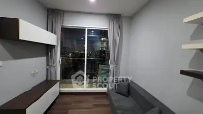 Modern living room with city view and sleek furniture design