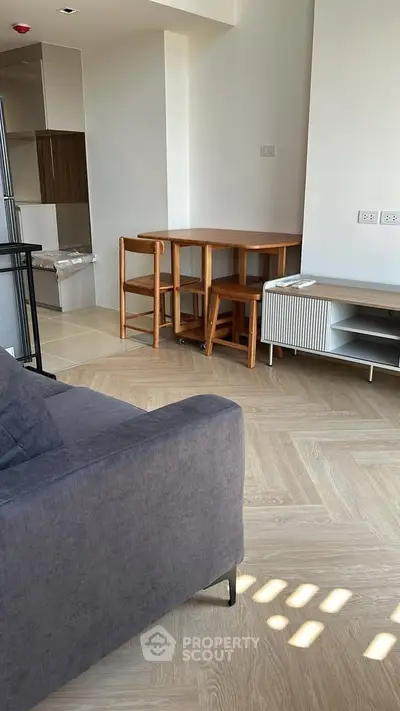 Modern living room with stylish furniture and natural light