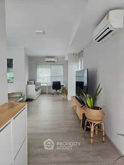 Modern living room with air conditioning and stylish decor