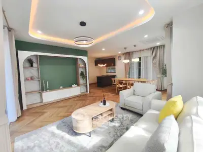 Spacious modern living room with elegant lighting and open layout