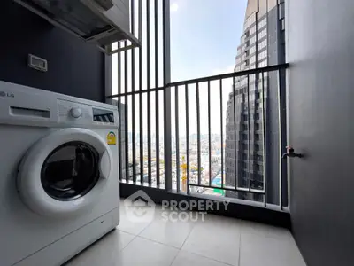 Modern high-rise balcony with washing machine and stunning city view
