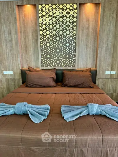 Luxurious bedroom with elegant decor and ambient lighting