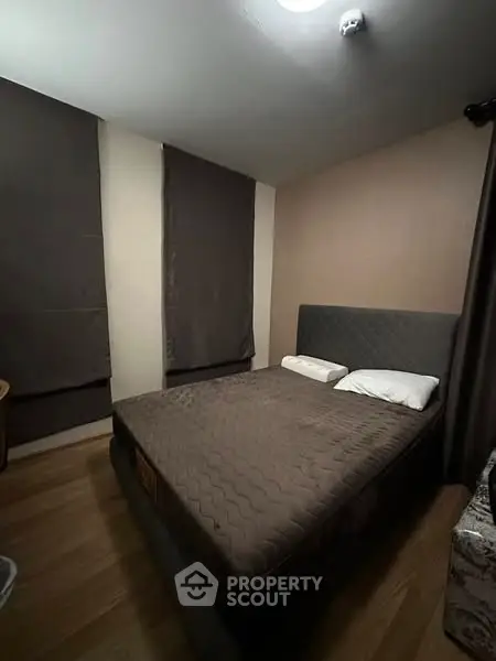 Cozy bedroom with modern decor and comfortable bedding
